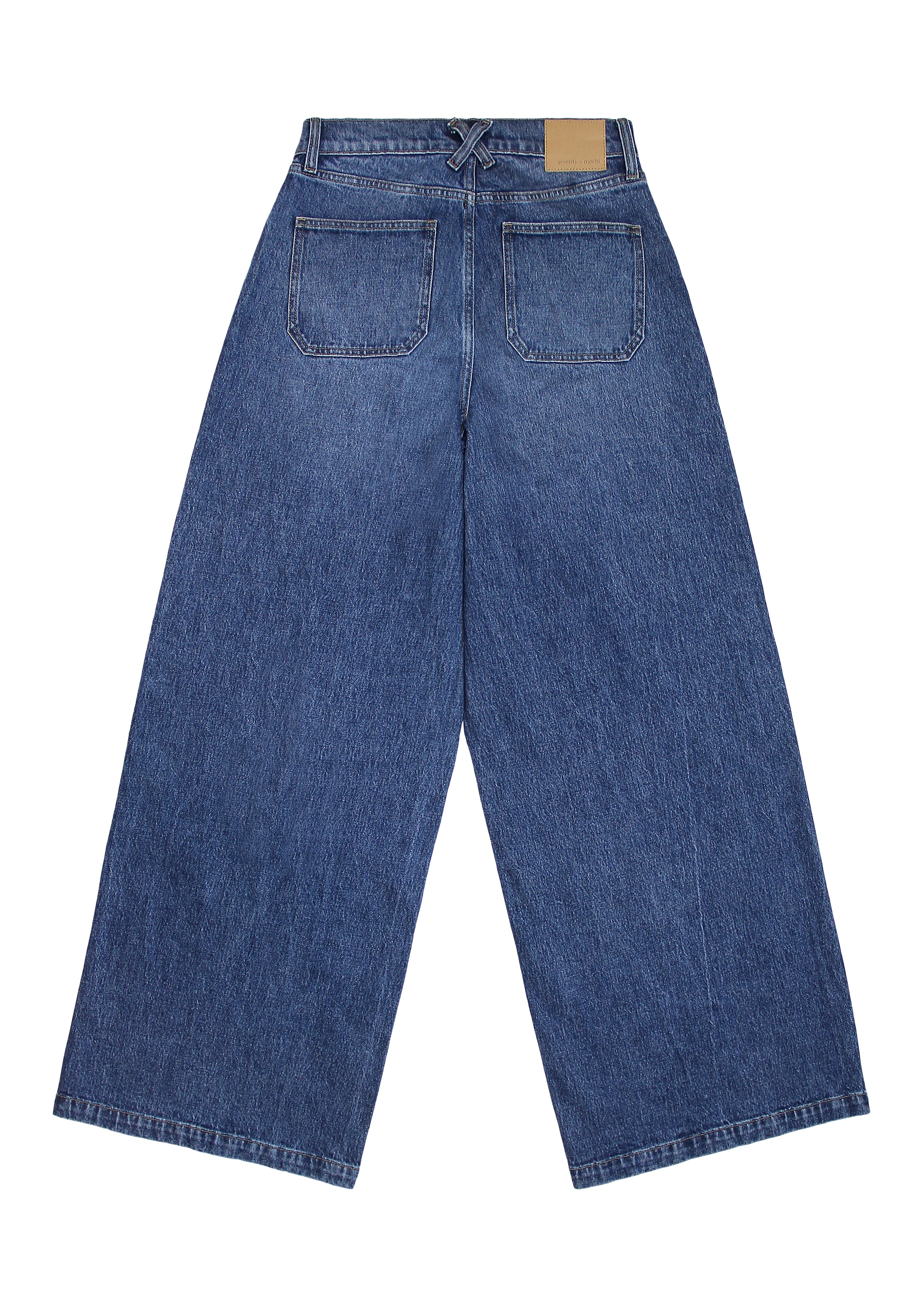 Blue wide leg jeans on a white background