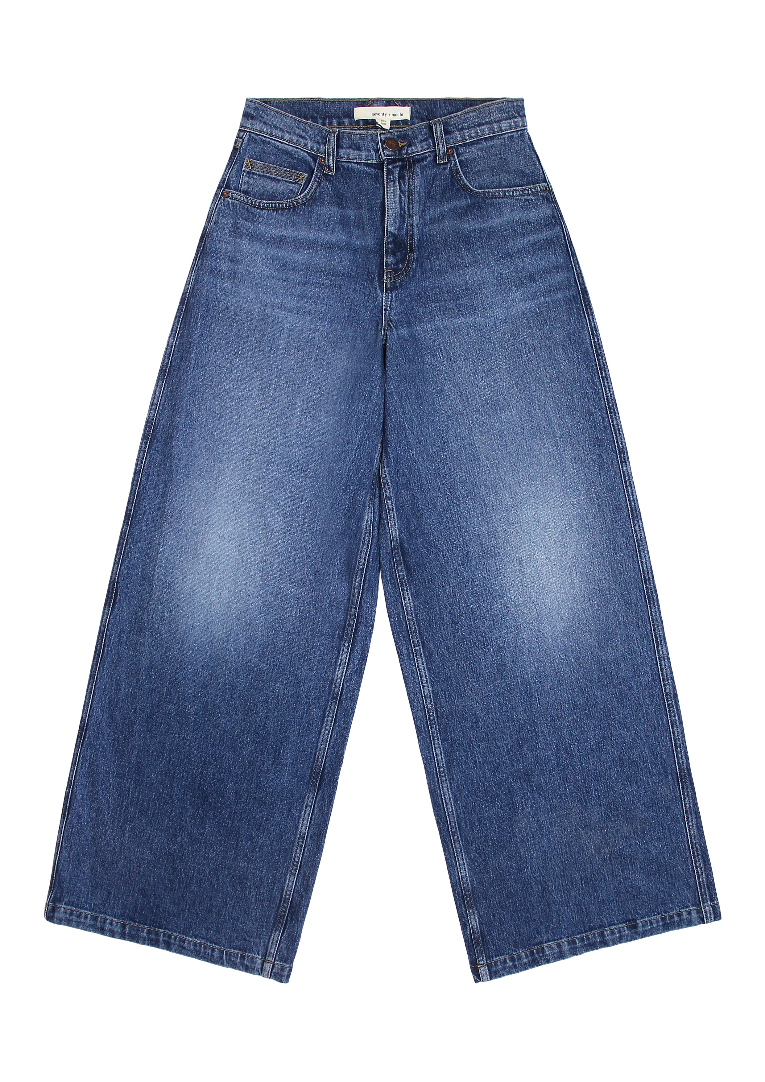 Blue wide leg jeans on a white background